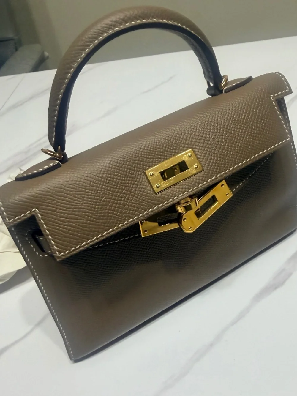 Mini top handle bag.. Kelly